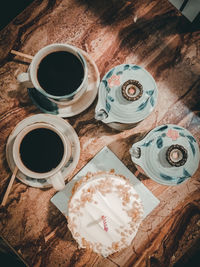 High angle view of coffee cup on table