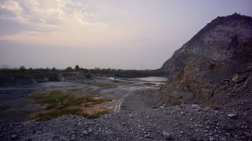 Scenic view of landscape against sky during sunset