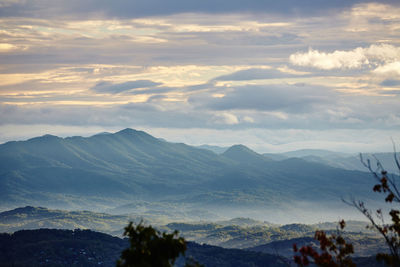 Scenic view of mountains against sky during sunset