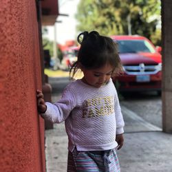 Girl standing outdoors