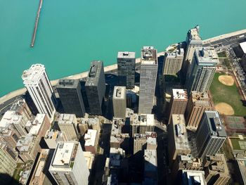 High angle view of modern buildings by river