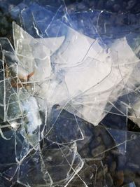 Full frame shot of broken glass window