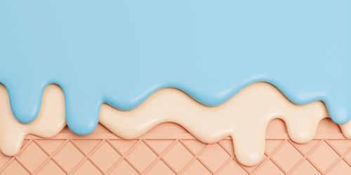 Close-up of wall against blue background