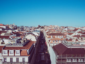 High angle view of townscape against clear blue sky