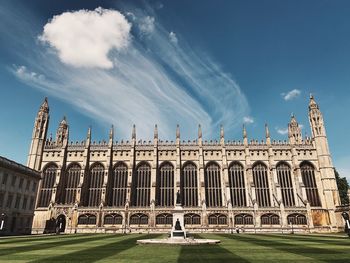 Low angle view of historical building against cloudy sky