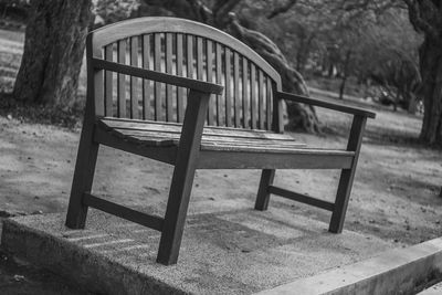 Empty bench in park