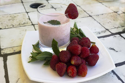 High angle view of strawberries on table