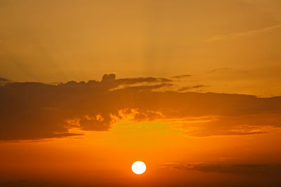 Scenic view of dramatic sky during sunset