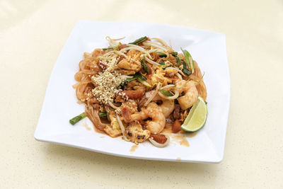 High angle view of pasta in plate on table