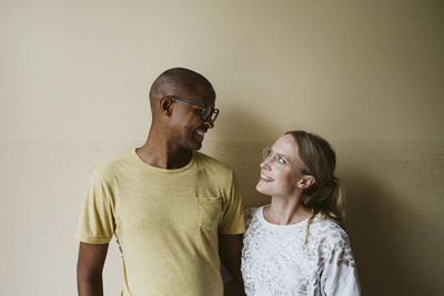 Smiling couple looking at each other