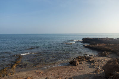 Scenic view of sea against clear sky