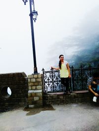 Young woman standing in park