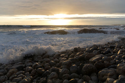 Scenic view of sea during sunset