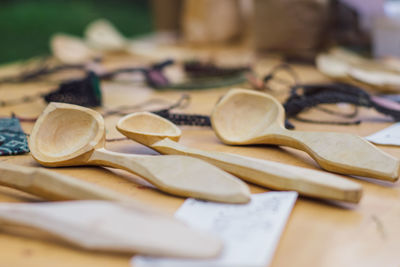Close-up of wooden spoons on table