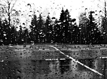 Close-up of water drops on glass window