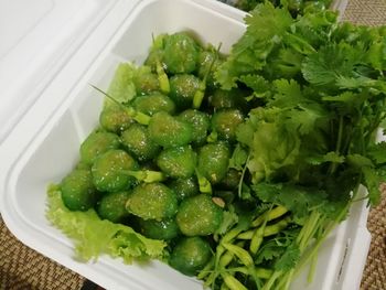 High angle view of chopped vegetables in bowl on table