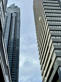 Low angle view of modern buildings against sky