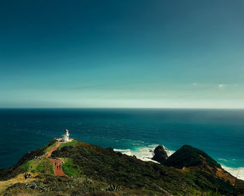 High angle view of sea against blue sky