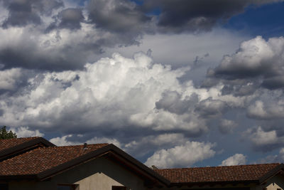 Low angle view of houses against sky