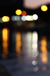 Defocused image of illuminated lights at night