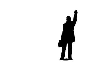 Silhouette people standing against white background