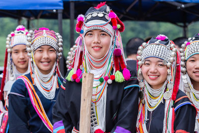 Portrait of smiling young woman in traditional clothing