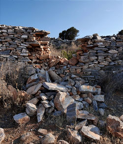 Stack of rocks against clear sky