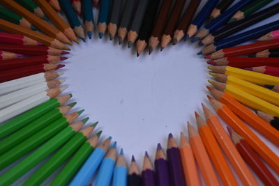 High angle view of multi colored pencils on table