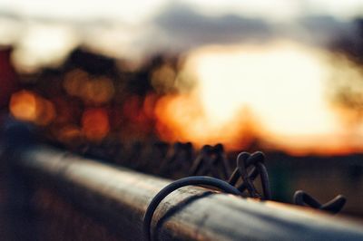 Close-up of metal against sky