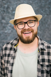 Portrait of young man wearing hat