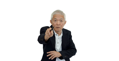 Portrait of man against white background