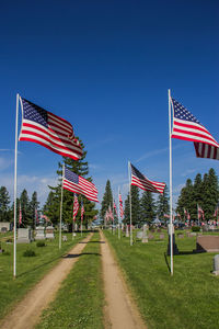 Pathway along american flags