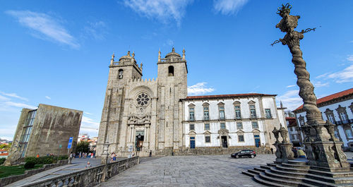 Buildings in city against sky