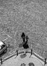 High angle view of people on street in city