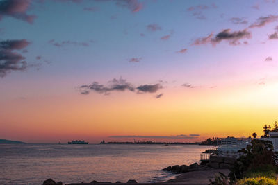 Scenic view of sea against sky during sunset