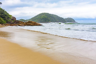 Scenic view of beach against sky