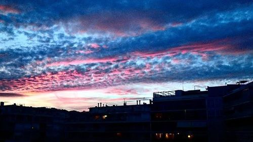 Low angle view of dramatic sky during sunset