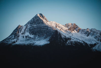 Sunset on a mountain peak in alaska 