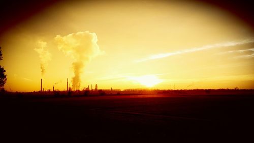 Scenic view of landscape at sunset