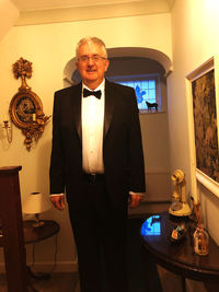 Portrait of a man standing with food