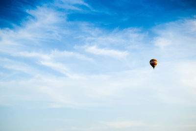 Low angle view of hot air balloon against sky with copy space