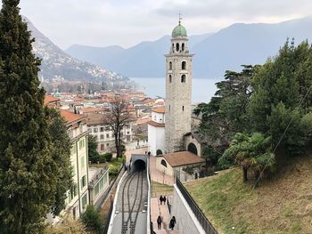 Panoramic view of buildings in city against sky