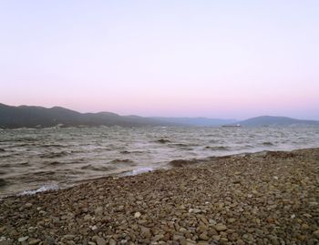 Scenic view of sea against clear sky