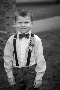 Portrait of smiling boy wearing suspenders