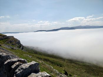 Scenic view of land against sky