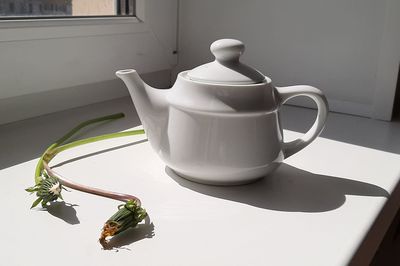 Close-up of coffee cup on table