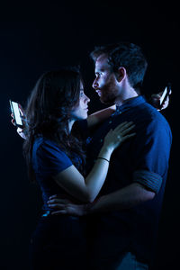 Side view of young couple