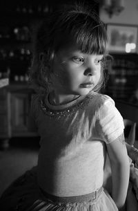 Portrait of cute girl looking away