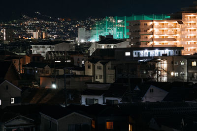 High angle view of illuminated cityscape