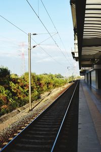 Railroad station platform against sky